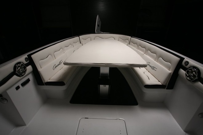 Plenty of room forward aboard the new ’Top Fish Open’. That table can be lowered to make a sunpad or removed altogether for fishing. - Cigarette legend goes fishin © Cigarette Racing